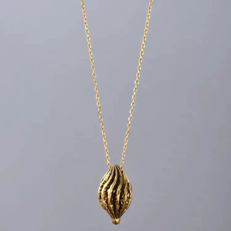Caivera Gold Plated Brass Long Pendant Necklace – Ribbed Oval Pendant, 31 inch
