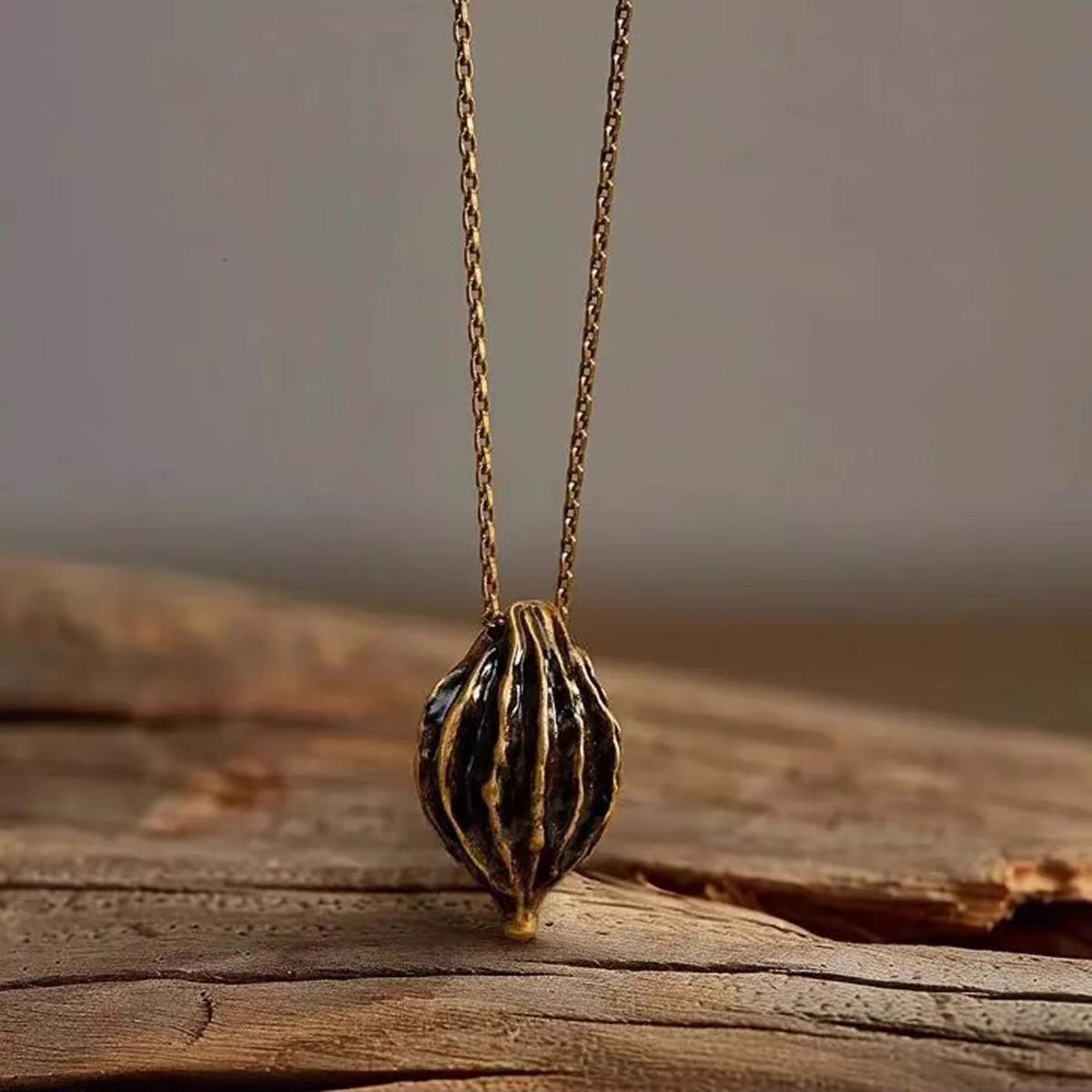 Caivera Gold Plated Brass Long Pendant Necklace – Ribbed Oval Pendant, 31 inch